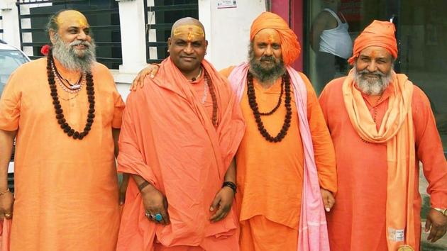 Swami Kanhaiya Prabhunandan Giri (2nd from left) alleged he was not invited for Ram temple bhoomi pujan for being a Dalit. (HT Photo)