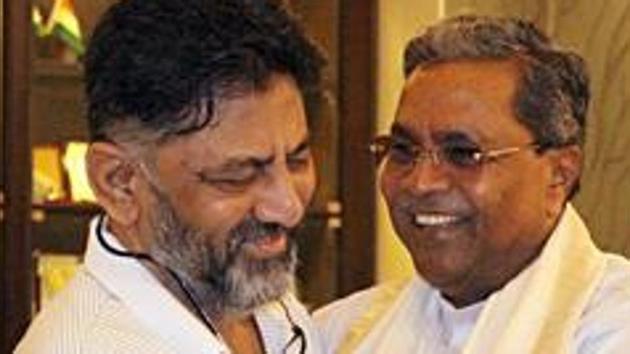 Former Chief Minister of Karnataka Siddaramaiah with Congress leader DK Shivakumar.(ANI PHOTO.)