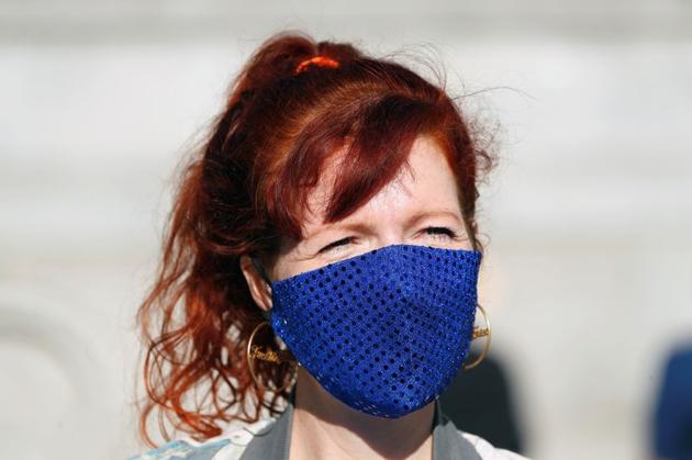Heather Phillipson looks on, after her sculpture ''THE END'' was unveiled on Trafalgar Square's Fourth Plinth, in London, Britain, July 30, 2020. (REUTERS)