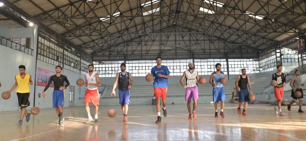 Ludhiana, India – October 24, 2017 : Basketball players practicing at Indoor basketball stadium, Ludhiana.(Photo by Gurpreet Singh/Hindustan Times)