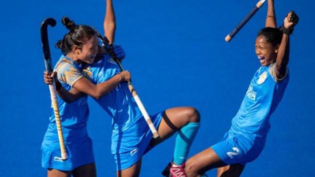 Mumtaz Khan IND celebrates scoring the opening goal with Lalremsiami IND and Salima Tete IND in the Hockey5s Women's Gold Medal Match at the Hockey Field, Youth Olympic Park.(REUTERS)