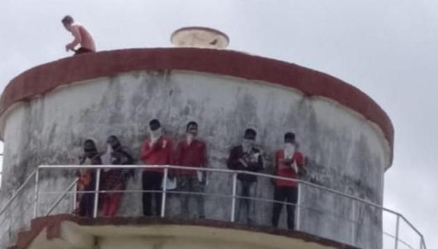 School children in Odisha on water tank.(HT)