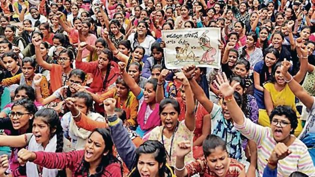 People shout slogans during a protest against the alleged rape and murder of a 27-year-old woman in Hyderabad.(Reuters)