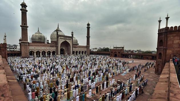 Devotees stand in congregation as they offer Eid al-Adha prayers at Jama Masjid in New Delhi on August 1. Concerns brought about by the coronavirus pandemic appeared to have dampened the festive spirit of Eid al-Adha in India with many people keeping indoors. Thinner congregations were seen at mosques that have in previous years hosted crowds spilling on to the streets. (Ajay Aggarwal / HT Photo)