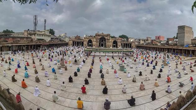 A congregation prays at the Jumma Masjid in Ahmedabad while complying with social distancing on August 1. The new normal dictated by the coronavirus is also casting a shadow on traditional forms of celebration. Visits to relatives and dear ones and the sharing of festive hugs are moves too risky amid fears of possibly spreading infection. (PTI)