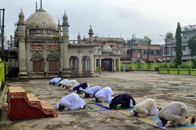 A small congregation offers namaz at Gedu Mian's mosque on the occasion of Eid al-Adha in Agartala on August 1. The festival just like Eid al-Fitr after Ramzan, depends on the sighting of the new crescent moon. It begins on the 10th day of the one of the holiest months of the Islamic calendar. (PTI)