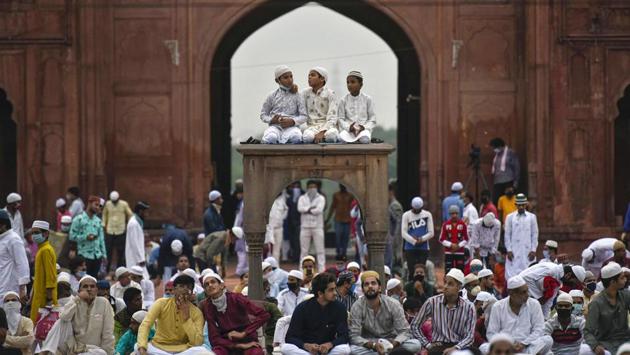 Muslim devotees during the sermon and Eid al-Adha prayers at Jama Masjid in New Delhi on August 1. Thermal screenings before entry, signboards requesting people to wear masks and ensure physical distancing while offering namaz, and minimal hugging were witnessed at the Jama Masjid in Delhi, PTI reported. (Biplov Bhuyan / HT Photo)