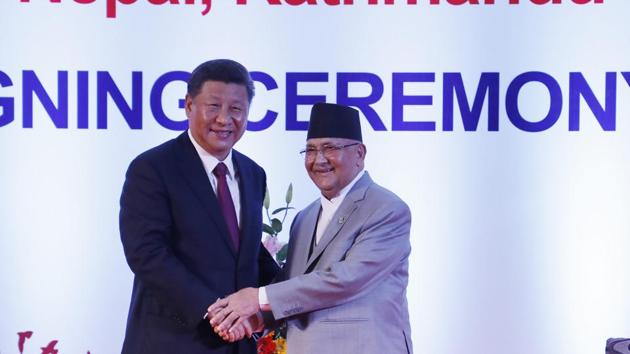 Chinese President Xi Jinping, left, and Nepalese Prime Minister Khadga Prasad Oli.(HT Archive/AP)