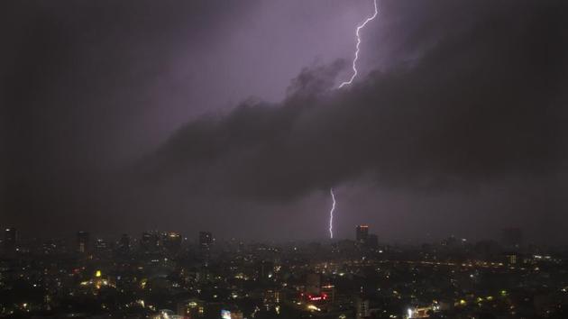 A bolt of lightning strikes during an evening storm in Mexico City, Friday, July 31, 2020.(AP)