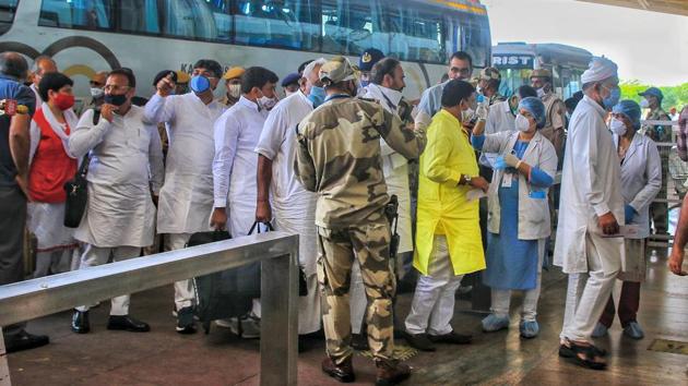 Rajasthan Congress MLAs at Jaipur Airport on their way to Jaisalmer amid the ongoing political crisis in Rajasthan.(PTI PHOTO.)