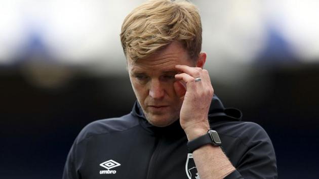 Bournemouth’s manager Eddie Howe walks off the pitch after their English Premier League soccer match against Everton.(AP Photo)