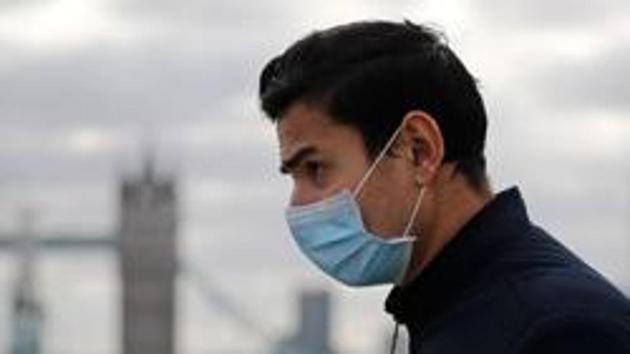 Ministers are seeking to balance the need to damp down flare-ups of the virus while rebooting the U.K. economy, which is facing its worst recession in 300 years.(AFP)