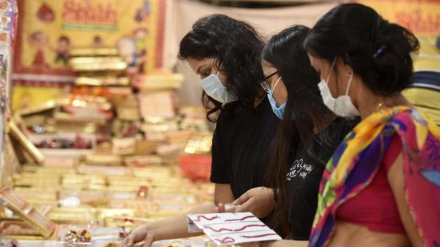 People shopping on the eve of Rakshabandhan festival at Sadar Bazar, in Gurugram, India, on Sunday, August 02, 2020. (Photo by Parveen Kumar/Hindustan Times)