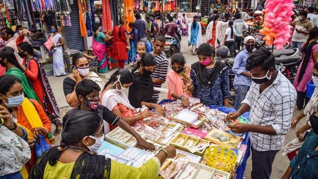 Women purchase rakhi on the eve of Raksha Bandhan festival during Unlock 3.0, at Besant Road in Vijayawada, Sunday, August 02, 2020. (PTI)