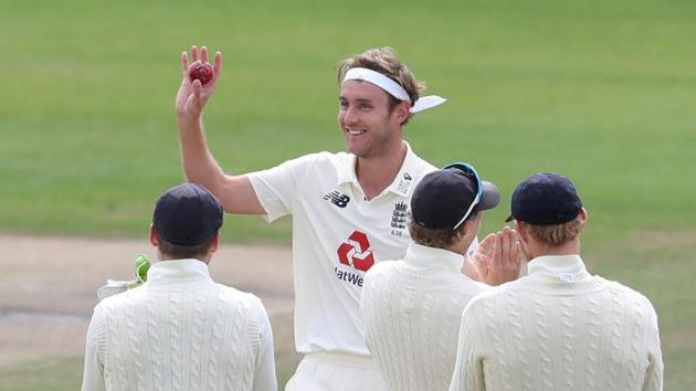 FILE PHOTO: Cricket - Third Test - England v West Indies - Emirates Old Trafford, Manchester, Britain - July 28, 2020 England's Stuart Broad celebrates taking his 500th test wicket with teammates after taking the wicket of West Indies' Kraigg Brathwaite, as play resumes behind closed doors following the outbreak of the coronavirus disease (COVID-19) Martin Rickett/Pool via REUTERS/File Photo(REUTERS) FILE PHOTO: Cricket - Third Test - England v West Indies - Emirates Old Trafford, Manchester, Britain - July 28, 2020 England's Stuart Broad celebrates taking his 500th test wicket with teammates after taking the wicket of West Indies' Kraigg Brathwaite, as play resumes behind closed doors following the outbreak of the coronavirus disease (COVID-19) Martin Rickett/Pool via REUTERS/File Photo(REUTERS)