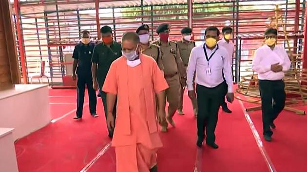 Uttar Pradesh Chief Minister Yogi Adityanath arrives to take stock of preparations ahead of the foundation stone laying ceremony of Ram Temple on August 5, in Ayodhya on Monday. (ANI) Uttar Pradesh Chief Minister Yogi Adityanath arrives to take stock of preparations ahead of the foundation stone laying ceremony of Ram Temple on August 5, in Ayodhya on Monday. (ANI)