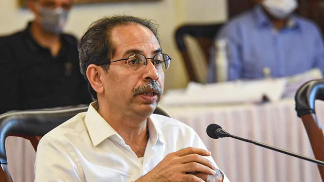 Maharashtra chief minister Uddhav Thackeray interacts with senior officials at a review meeting in Pune.(PTI)