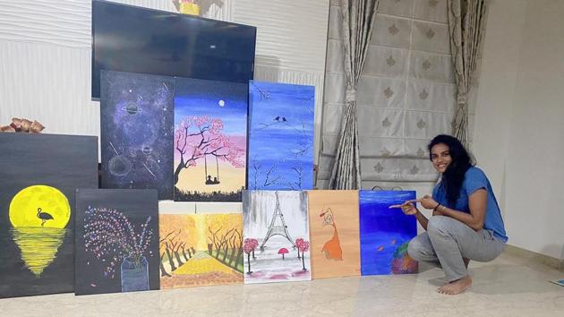 PV Sindhu with her paintings.(Special Arrangement)