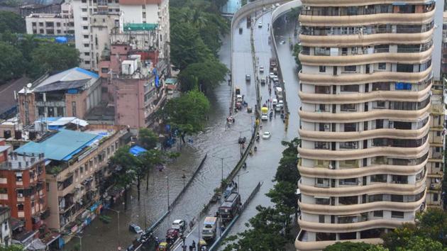 An aerial view of a waterlogged street at Parel, following heavy rainfall in Mumbai on August 4. The Maharashtra government has announced a holiday for all its offices in Mumbai city and suburbs on August 4 in view of the heavy rainfall in the metropolis and neighbouring areas, PTI reported. (PTI)