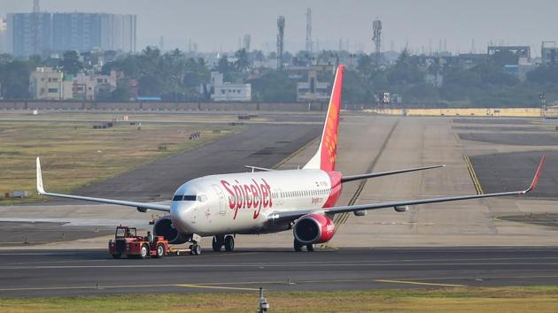 A SpiceJet plane prepares to take-off from Chennai airport for domestic travel, after flights resumed during the ongoing nationwide lockdown, in Chennai.(PTI)