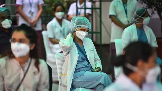 Doctors and health workers at an event in Sir Ganga Ram Hospital, New Delhi on August 4. On average, just over 2,900 COVID-19 patients have been admitted in hospitals over the last week, HT reported. (Sanchit Khanna / HT Photo)