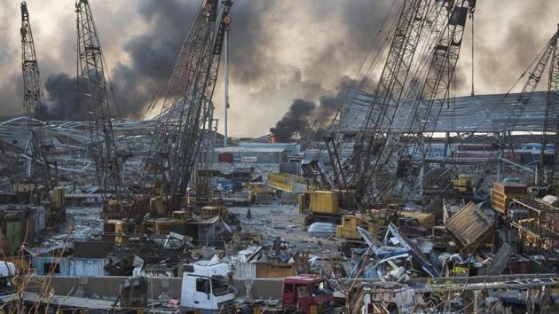 Smoke rises in the aftermath of a massive explosion in Beirut, Lebanon on Tuesday.(AP Photo) Smoke rises in the aftermath of a massive explosion in Beirut, Lebanon on Tuesday.(AP Photo)