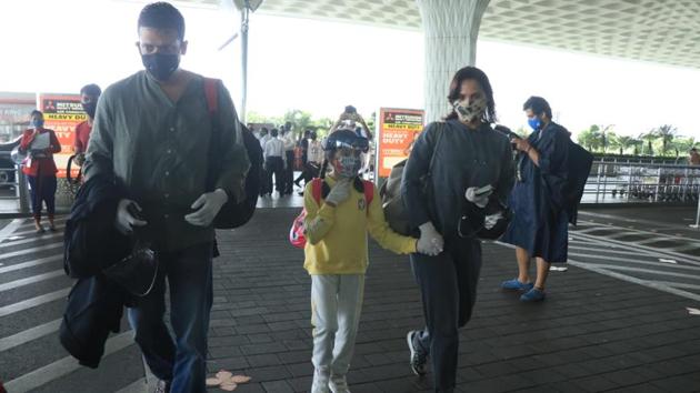 Lara Dutta seen at the airport with husband, tennis ace Mahesh Bhupathi and their daughter Sara. (Varinder Chawla)