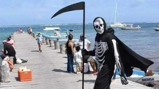 Unidentified man spotted at Puerto Morelos, Mexico, dressed as ‘Death’ to spread awareness about Covid-19.(Instagram)