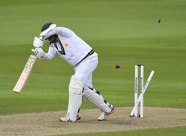 Pakistan's Abid Ali is bowled out by England's Jofra Archer during the first day of the first cricket Test match between England and Pakistan at Old Trafford in Manchester, England, Wednesday, Aug. 5, 2020. (Dan Mullan/Pool via AP) (AP)