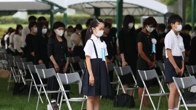 People, including children offer prayers during the ceremony to mark the 75th anniversary of the atomic bombing at the Hiroshima Peace Memorial Park on August 6. The bombing of Hiroshima was followed by the bombing of Nagasaki on August 9, 1945 --instantly killing more than 75,000 people. Japan surrendered six days later, ending World War Two. (AFP)