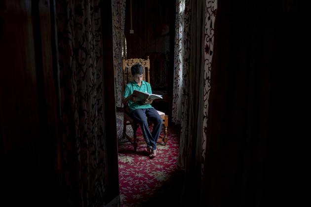 Mohsin Shafi holds a book and sits for a photograph inside their houseboat on the Dal Lake in Srinagar, Jammu and Kashmir, Wednesday, July 22, 2020. Schools in the region reopened after six months in late February, after a strict lockdown that began in August 2019, when India scrapped the region’s semi-autonomous status. In March schools were shut again because of the coronavirus pandemic. "We are not able to keep up with lessons online and we miss our regular school," he said. (AP) Mohsin Shafi holds a book and sits for a photograph inside their houseboat on the Dal Lake in Srinagar, Jammu and Kashmir, Wednesday, July 22, 2020. Schools in the region reopened after six months in late February, after a strict lockdown that began in August 2019, when India scrapped the region’s semi-autonomous status. In March schools were shut again because of the coronavirus pandemic. "We are not able to keep up with lessons online and we miss our regular school," he said. (AP)