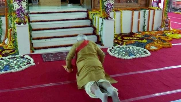 Prime Minister Narendra Modi offers prayers to Ram Lalla performing 'Sashtang pranam' (prostration) at Ram Janmabhoomi, in Ayodhya on Wednesday.(ANI Photo)