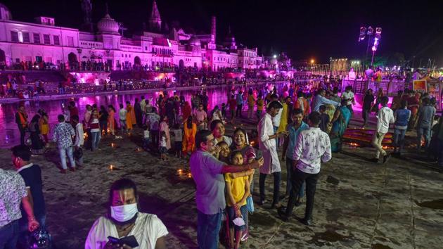 Hindu devotees gather at illuminated Ram Ki Paidi to celebrate the groundbreaking ceremony of the Ram Temple, in Ayodhya on August 5, 2020.(PTI Photo)