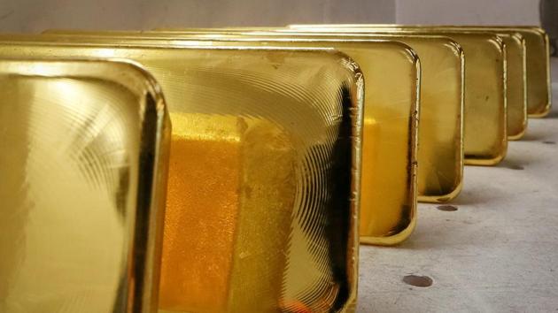 Newly cast ingots of 99.99% pure gold are stored after weighing at the Krastsvetmet non-ferrous metals plant, one of the world's largest producers in the precious metals industry, in the Siberian city of Krasnoyarsk, Russia.(Reuters File Photo)