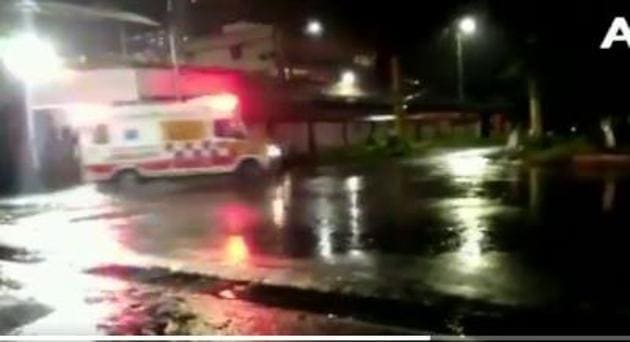 Ambulance seen rushing to the site of the plane crash in Kozhikode.(ANI Photo)