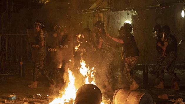 Riot police advance to push back demonstrators, during the protest in Beirut on August 7. The death toll from the explosion rose from 137 to 149 on Thursday evening, the health ministry said, and was expected to further rise as rescue workers kept digging through the rubble, AFP reported. (AP / PTI)