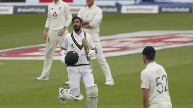 Manchester: Pakistan's Shan Masood runs to celebrate scoring a century during the second day of the first cricket Test match between England and Pakistan at Old Trafford in Manchester. (AP)