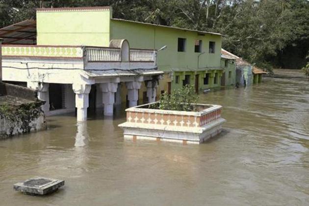 A view of the flooded Cauvery river, downstream of Krishnaraja Sagar (KRS) reservoir near Srirangapatna in Mandya district, Karnataka.(AP)