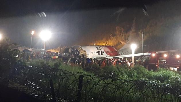 The Air India Express flight that skidded off a runway while landing at the airport in Kozhikode, Kerala. (AP) The Air India Express flight that skidded off a runway while landing at the airport in Kozhikode, Kerala. (AP)