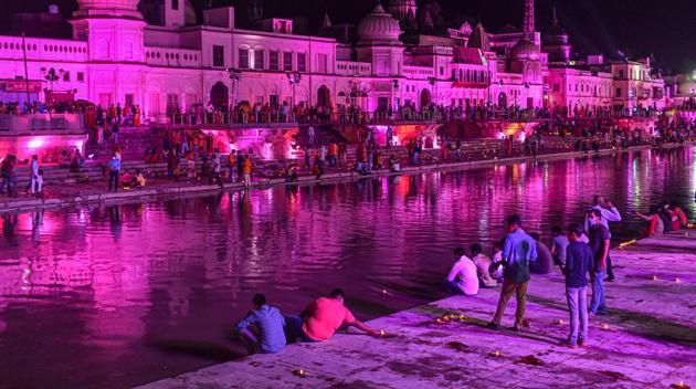 Hindu devotees light earthen lamps at illuminated Ram Ki Paidi to celebrate the groundbreaking ceremony of the Ram Temple, in Ayodhya on August 05, 2020. (PTI Photo) Hindu devotees light earthen lamps at illuminated Ram Ki Paidi to celebrate the groundbreaking ceremony of the Ram Temple, in Ayodhya on August 05, 2020. (PTI Photo)