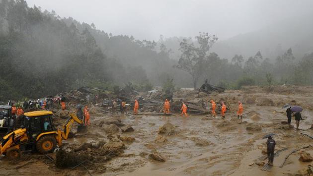 Rescue work underway at the site of a mudslide due to heavy rain in Kerala’s Idukki district on August 7. A settlement of tea estate workers was buried under slush and rocks triggered by a landslide after the region received incessant rainfall over the last three days. (AP)