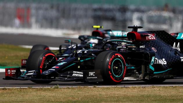 Formula One F1 - 70th Anniversary Grand Prix - Silverstone Circuit, Silverstone, Britain - August 8, 2020 Mercedes' Lewis Hamilton and Mercedes' Valtteri Bottas in action during practice Frank Augstein.(REUTERS)