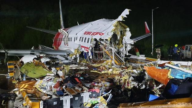An Air India Express plane crashed at the Kozhikode airport on Friday evening.(HT Photo) An Air India Express plane crashed at the Kozhikode airport on Friday evening.(HT Photo)