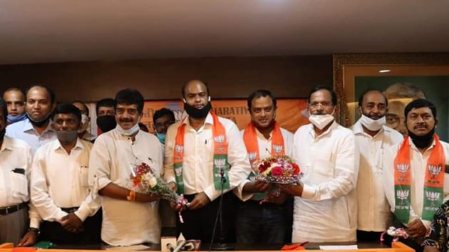 Former Congressmen Roy Ravi Naik and his brother Ritesh joining the BJP in Panaji on Thursday.(https://twitter.com/BJP4Goa)