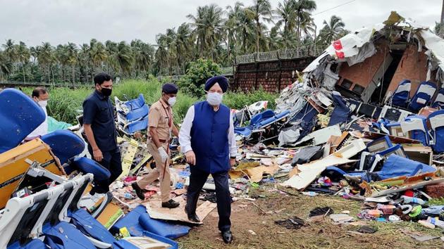 Civil aviation minister Hardeep Singh Puri also visited the crash site next to Kozhikode airport on Saturday.(ANI Photo) Civil aviation minister Hardeep Singh Puri also visited the crash site next to Kozhikode airport on Saturday.(ANI Photo)