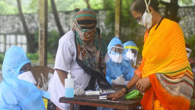 Covid-19 screening and swab testing camp of the residents at Trombay Koliwada in Mumbai on Friday.(Pratik Chorge/HT Photo) Covid-19 screening and swab testing camp of the residents at Trombay Koliwada in Mumbai on Friday.(Pratik Chorge/HT Photo)