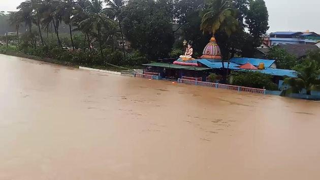 A temple submerged in water due to the overflowing of the Hemavathi river in Hassan, Karnataka, August 8, 2020.(ANI) A temple submerged in water due to the overflowing of the Hemavathi river in Hassan, Karnataka, August 8, 2020.(ANI)