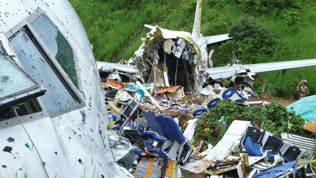 A security official inspects the site of the crash in Karipur on August 8. According to a playback on flight-tracking website FlightRadar24, the plane circled the airport twice before attempting to land. In its second instance, it aborted the attempt with 2,000 feet to go before the crash landing. (REUTERS) A security official inspects the site of the crash in Karipur on August 8. According to a playback on flight-tracking website FlightRadar24, the plane circled the airport twice before attempting to land. In its second instance, it aborted the attempt with 2,000 feet to go before the crash landing. (REUTERS)