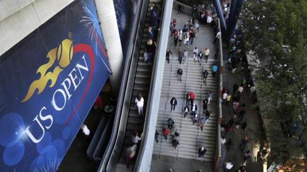 FILE - In this Sept. 3, 2017, file photo, tennis fans move in and out of Arthur Ashe Stadium during the fourth round of the U.S. Open tennis tournament in New York.(AP) FILE - In this Sept. 3, 2017, file photo, tennis fans move in and out of Arthur Ashe Stadium during the fourth round of the U.S. Open tennis tournament in New York.(AP)