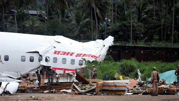 Wreckage of Air India Express flight at Kozhikode International Airport in Karipur on Saturday.(ANI Photo)